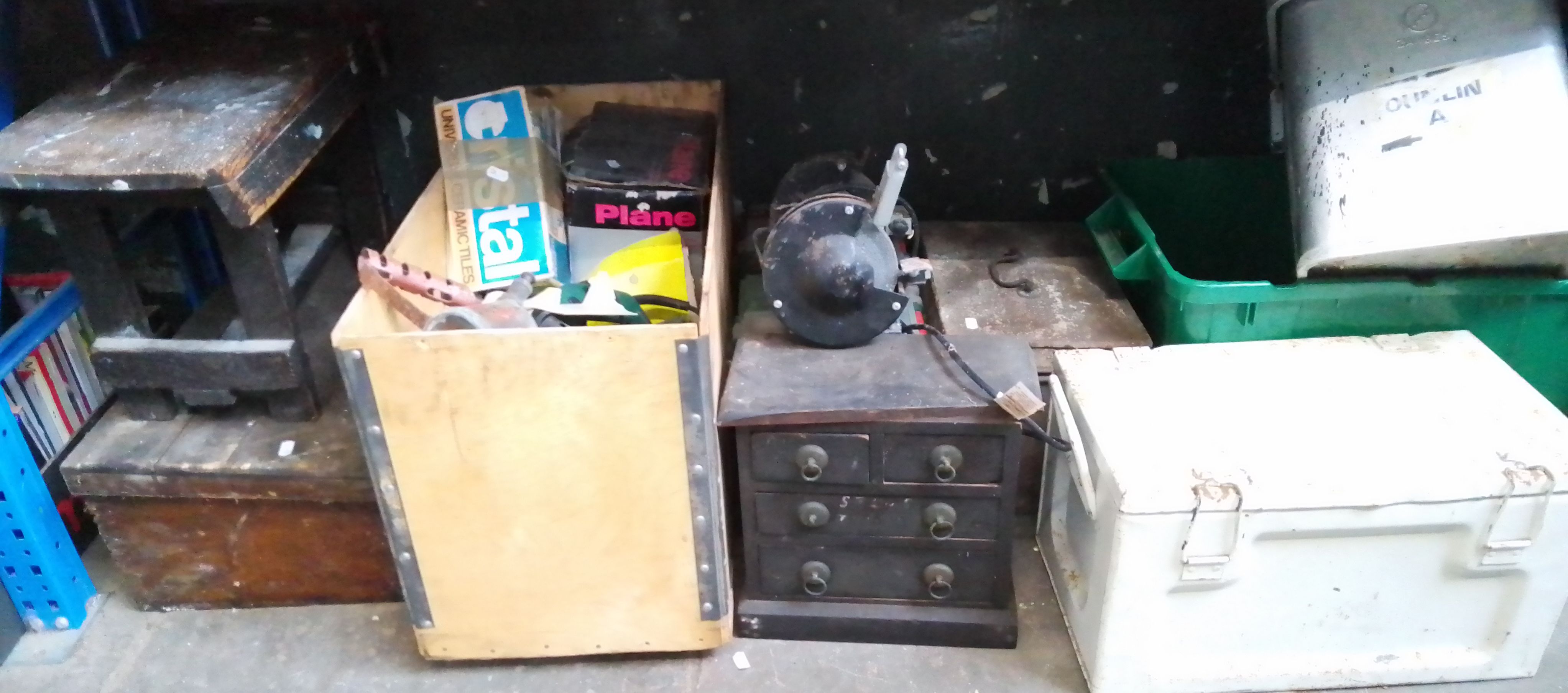 Tools to include bench grinder, oil cans, 3 metal containers, Bosch circular saw, 2 toolboxes with