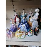 Fifteen Royal Doulton figurines etc.