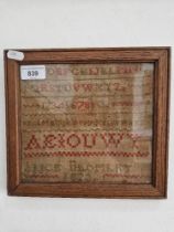 A 19th century sampler, dated 1823, framed and glazed, 24.5cm x 23cm (overall).