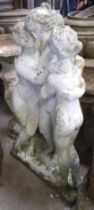 A garden ornament bearing three figures - lady and 2 children
