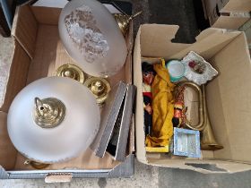 Two boxes of assorted items including glass and brass light fittings, a Pelham pirate puppet...