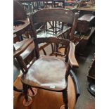 A 19th century beech and elm armchair.