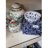 Two Chinese ginger jars together with a boxed Japanese ceramic bowl decorated with butterflies