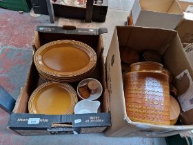 Two boxes of Hornsea pottery including lidded storage jars, coffee pot, jug, plates, etc.