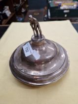 Silver lid from a cricket trophy