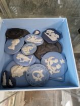 A box of assorted Wedgwood cameos.