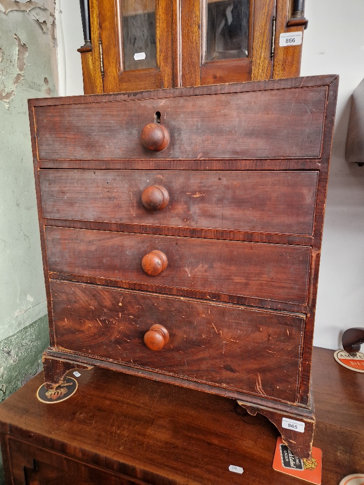 A 19th century pine chest of drawers with original scumble finish.