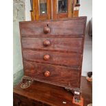 A 19th century pine chest of drawers with original scumble finish.