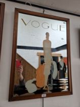 A Vogue advertising mirror, 55.5cm x 76cm.