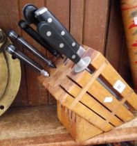 A knife block with a set of 6 Horeca knives and a sharpener