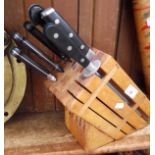 A knife block with a set of 6 Horeca knives and a sharpener