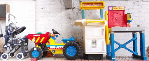 Three large toys - workbench, cooker/fridge, and a Big Jeff Dumper, Also includes child's pram