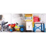 Three large toys - workbench, cooker/fridge, and a Big Jeff Dumper, Also includes child's pram