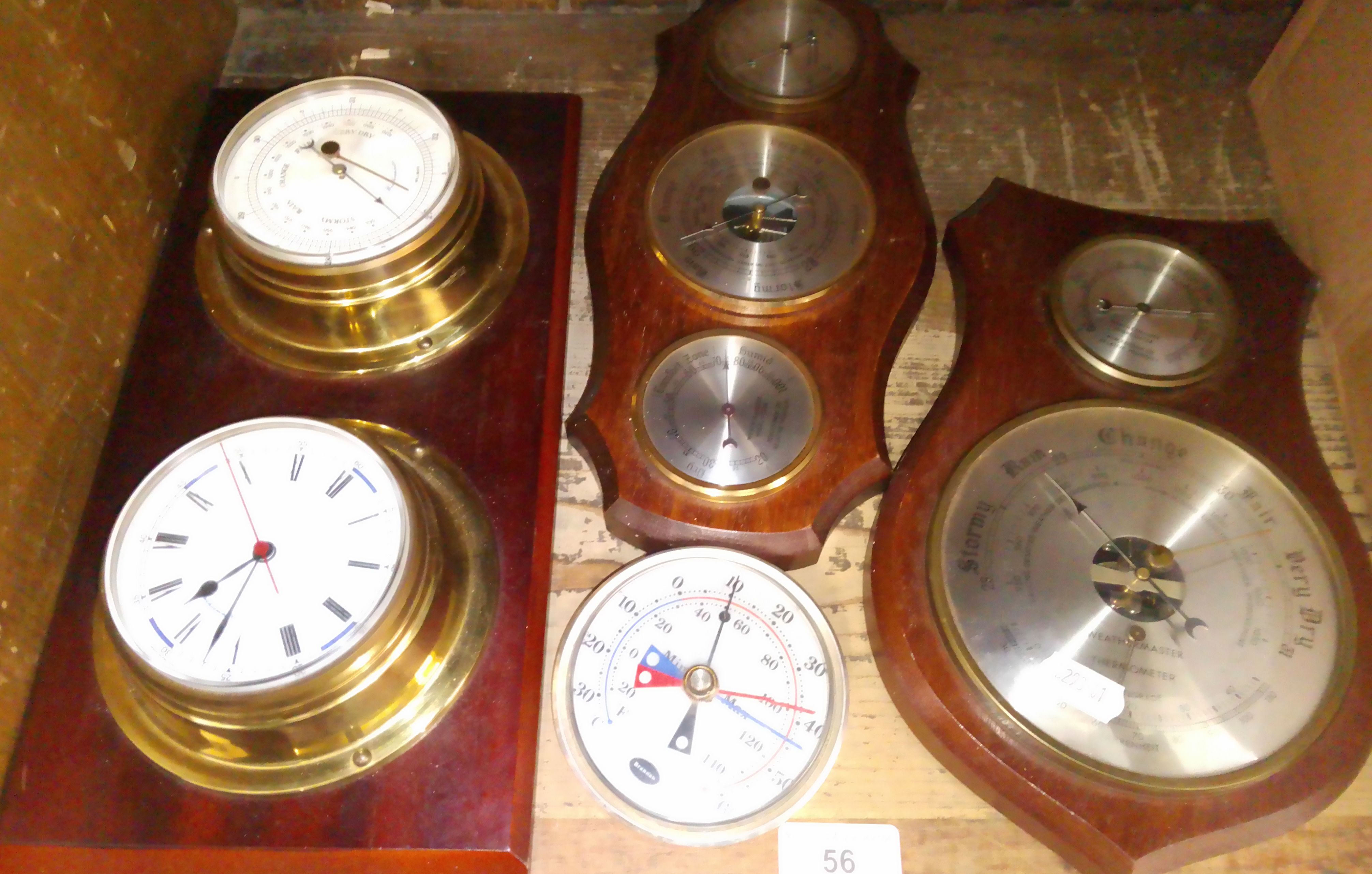 Various barometers and clock