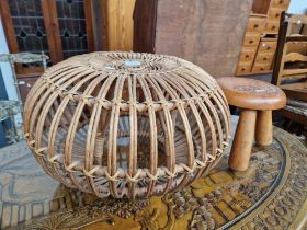 A 'lobster pot' cane stool together with another stool.