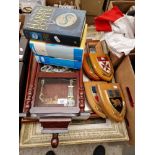 A mixed lot including original pictures, a clock, Harry Potter books and shields.