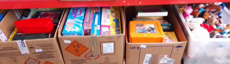 Four boxes of toys and games to include a box of McDonalds soft toys, Star Wars Monopoly, Cluedo,