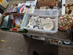 Two boxes of assorted ceramics and glass including a table lamp.