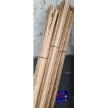 Three bundles of hardwood slats