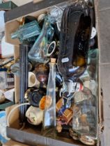 Three boxes of glassware and pottery.