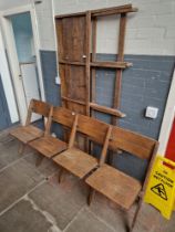 Two sets of early 20th century folding theatre seats.