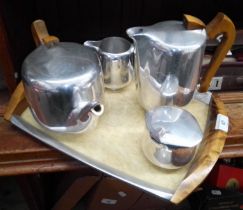 A 4 piece picquot tea set on a tray