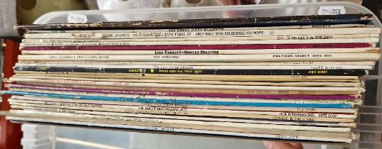 A box of vinyl LP Jazz records including Dizzy Gillespie, Milt Buckner, Woody Herman, etc.