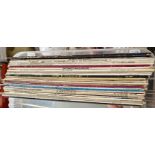 A box of vinyl LP Jazz records including Dizzy Gillespie, Milt Buckner, Woody Herman, etc.