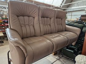 An Himolla brown leather 3 seater sofa.