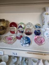 12 glass paperweights including Caithness