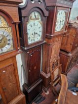 A 19th century eight day oak longcase clock with weights and pendulum, the dial marked 'William