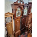 An eight day oak longcase clock with weights and pendulum, the dial marked William Nicoll,