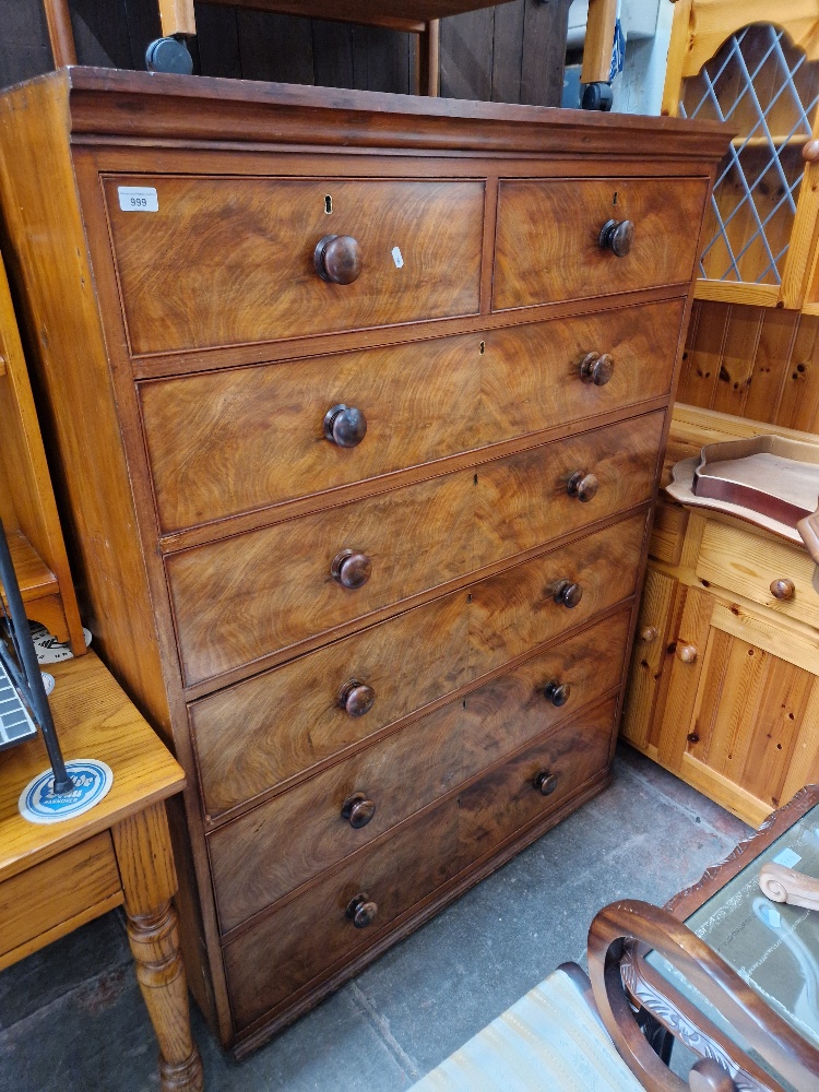 A large Victorian mahogany chest of drawers, probably originally the middle section of a wardrobe.