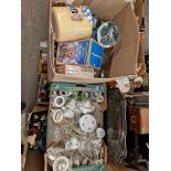 Two boxes of assorted glass and pottery including snow globes etc.