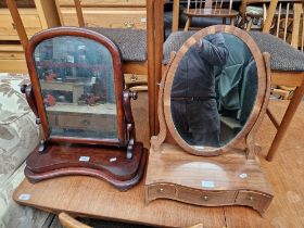 A 19th century mahogany toilet mirror together with another swing mirror with three drawers to base.