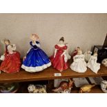 Seven Royal Doulton figures and one Coalport. Doulton figures - Autumn Breezes HN1934; Figure of the