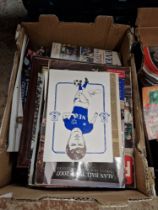 A box of Everton FC memorabilia.