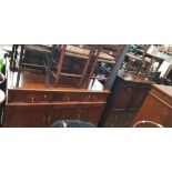 Various items of furniture; a 1920s oak sideboard, two bookcases with sliding glass doors, various