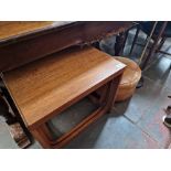 A mixed lot comprising mid 20th century teak nest of tables, retro leather pouffe and a floor