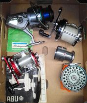 A box of sea and fly fishing reels