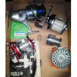 A box of sea and fly fishing reels