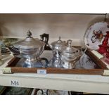 A vintage Art Deco silver plate tea set on wood & chrome tray.