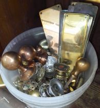 A box of brass and glass door furniture and fittings.