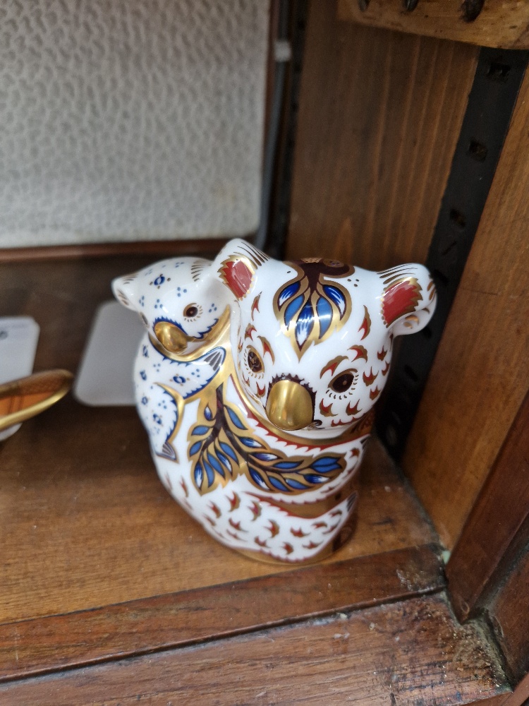 A Royal Crown Derby paperweight from the Australian Collection modelled as a Koala and Baby. Gold