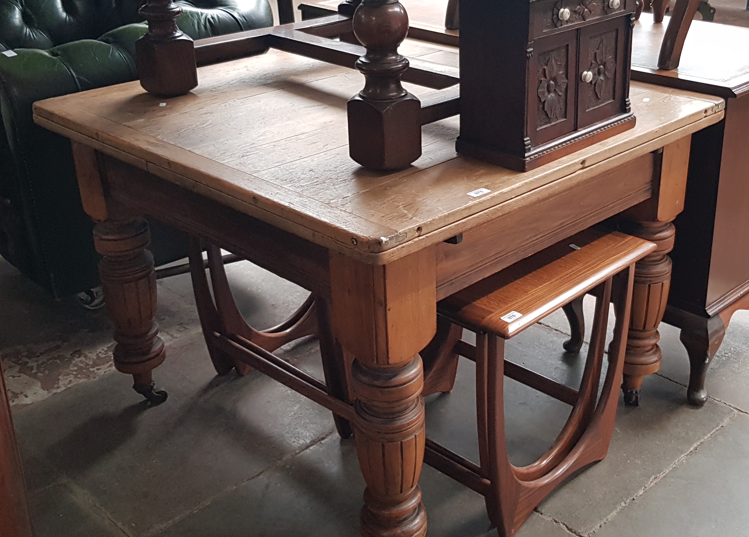 A Victorian beech and pine draw leaf kitchen/dining table.