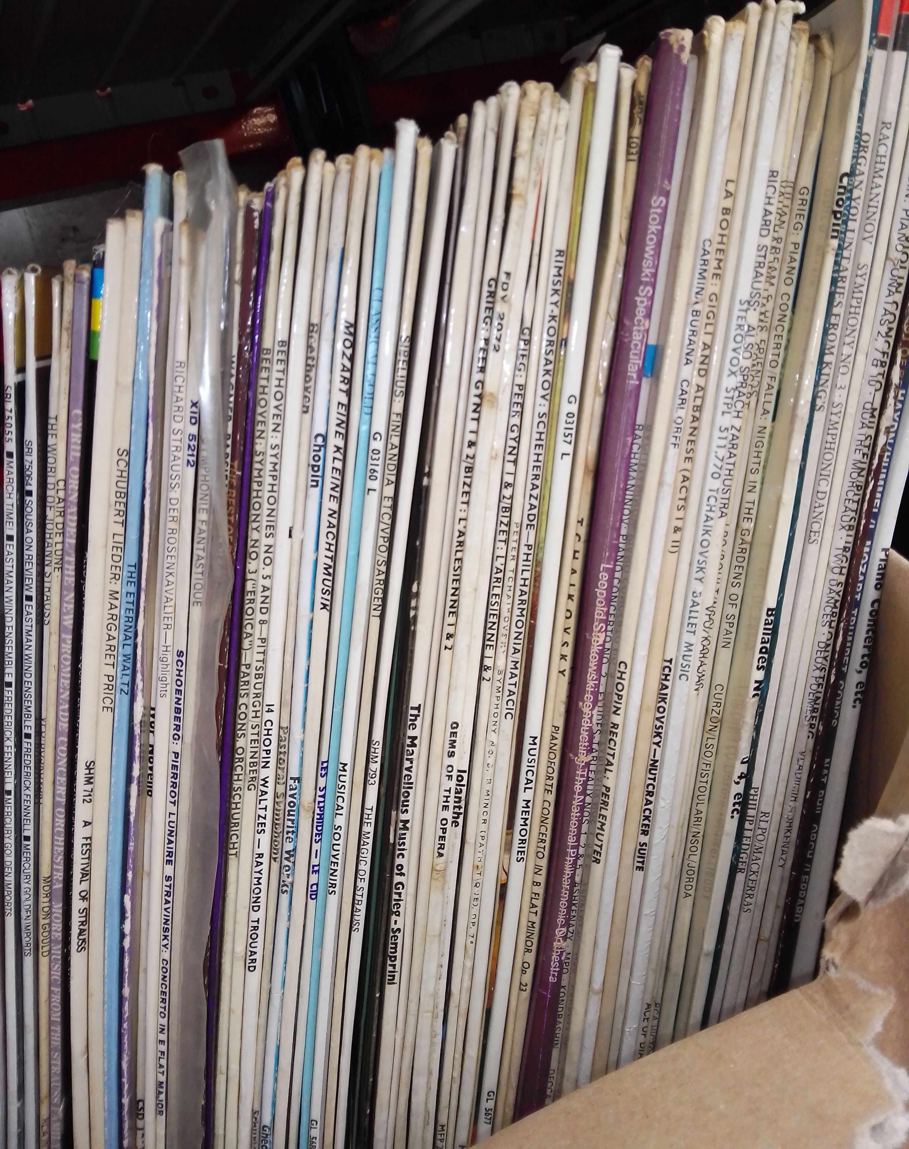 A box of classical vinyl LP records.