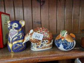 Three Royal Crown Derby paperweights; Koala, gold stopper, no box; Armadillo, silver stopper,