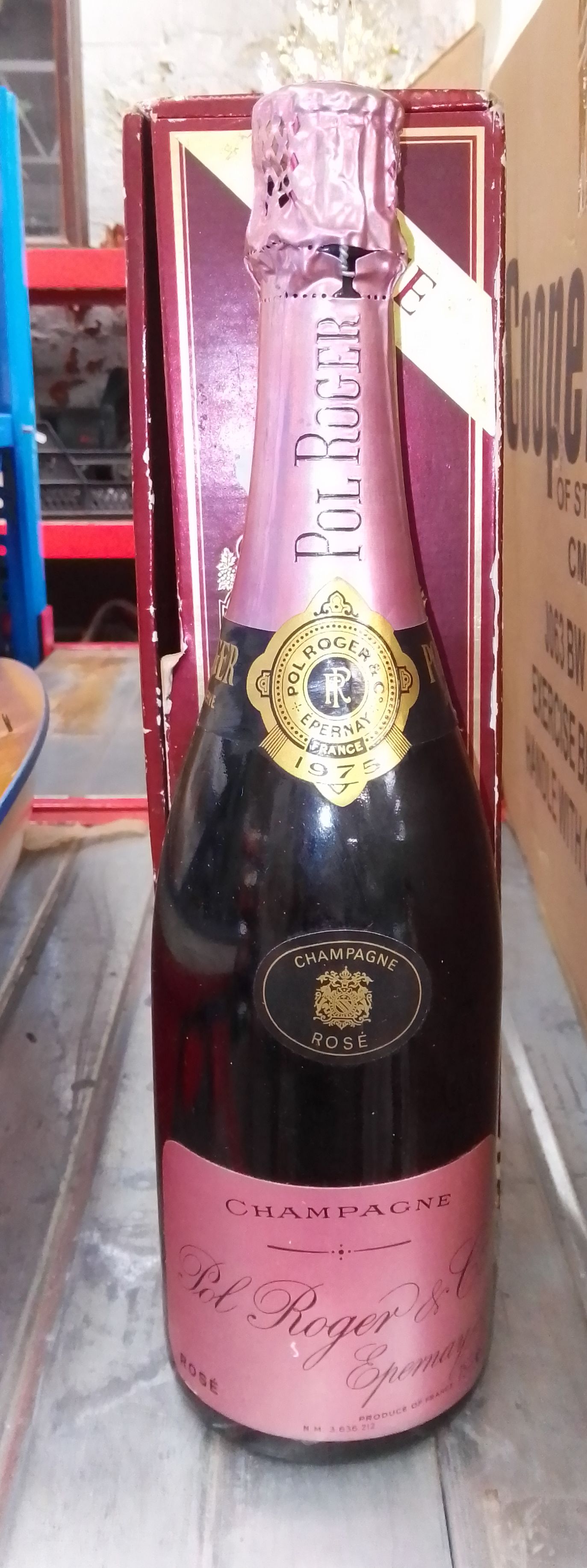 A bottle of Pol Roger Rose champagne in original box