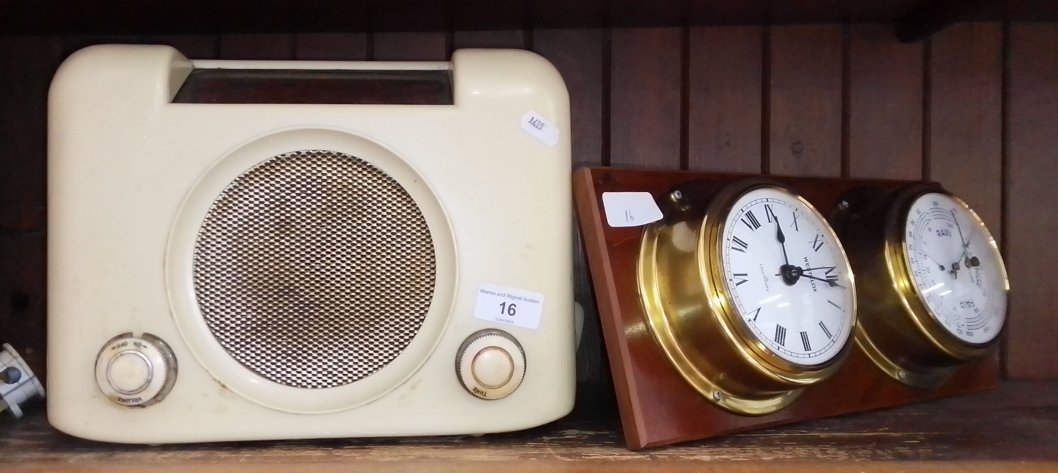 A Bush white bakelite radio together with a Westclox clock/barometer