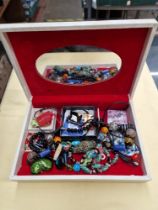 A jewellery box of mainly Murano and Venetian glass items.